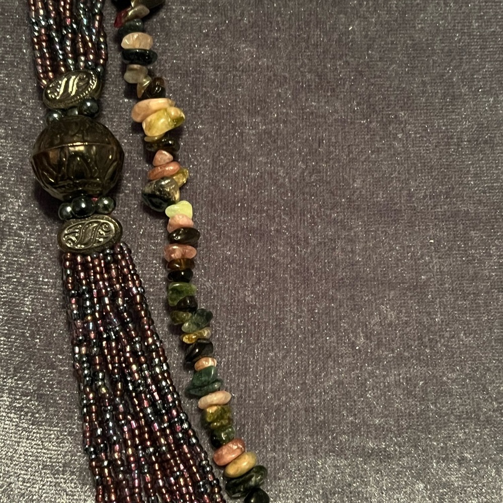 2 necklaces, purple & grey, one beaded, one stone chips
